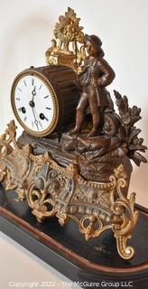 French Antique S Marti et Cie- Medaille de Bronze Clock with Boy and Fishing Pole on Base with Glass Dome Cloche.  13"tall excluding cloche. 