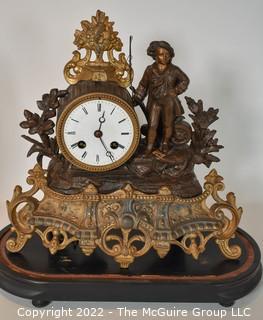 French Antique S Marti et Cie- Medaille de Bronze Clock with Boy and Fishing Pole on Base with Glass Dome Cloche.  13"tall excluding cloche. 