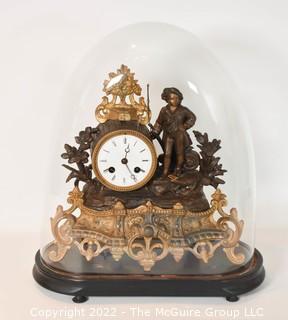 French Antique S Marti et Cie- Medaille de Bronze Clock with Boy and Fishing Pole on Base with Glass Dome Cloche.  13"tall excluding cloche. 