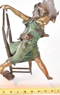 Bronze Sculpture of Girl On Chair with Kittens Signed by Juan Clara.  12" tall.