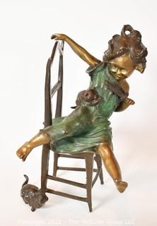 Bronze Sculpture of Girl On Chair with Kittens Signed by Juan Clara.  12" tall.