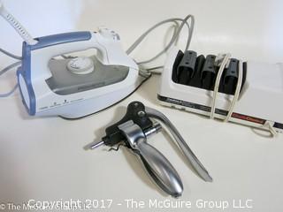 Housewares including iron, knife sharpener and cork extractor