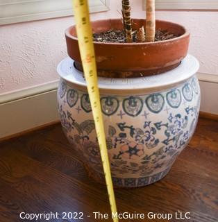 Large Asian Hand Painted on White Ground Porcelain Koi Fish Bowl Planter with Large Live Philodendron Plant. Plant measures 68" tall. Bowl measures 14" tall. 