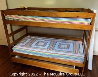 Four (Twin) Wood Beds: One Set of Bunk Beds, One Single Bed with Pull Out Trundle.