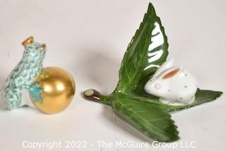 Two (2) Small Herend Hungary Hand Painted Porcelain Figurines of Frog with Gold Ball and Bunny on Leaf.  