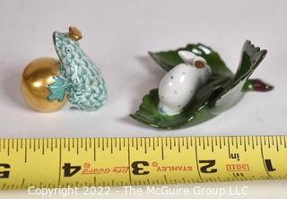 Two (2) Small Herend Hungary Hand Painted Porcelain Figurines of Frog with Gold Ball and Bunny on Leaf.  