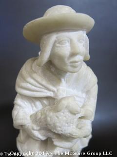 Carved figural sculpture