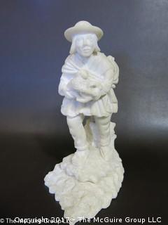 Carved figural sculpture