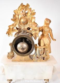 Early 19th Century Empire Style Gilt and Patinated Bronze Mantle Clock with Woman on Alabaster Base . 15"tall