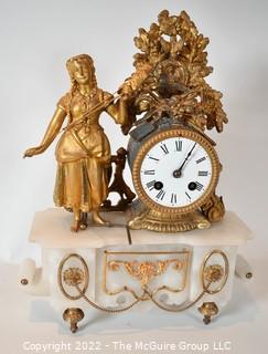 Early 19th Century Empire Style Gilt and Patinated Bronze Mantle Clock with Woman on Alabaster Base . 15"tall