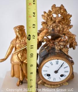 Early 19th Century Empire Style Gilt and Patinated Bronze Mantle Clock with Woman on Alabaster Base . 15"tall