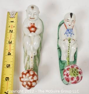 Two (2) Hand Painted Porcelain Chinese Figural Wall Mount Clothing Wall Hooks.  7" long