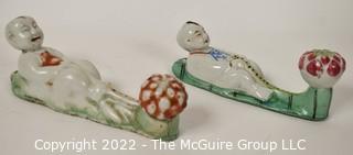 Two (2) Hand Painted Porcelain Chinese Figural Wall Mount Clothing Wall Hooks.  7" long