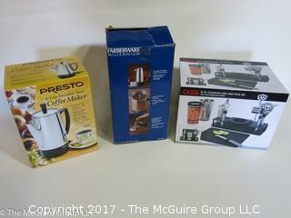 Housewares including PRESTO 6 cup coffee maker, FARBERWARE coffee pot and OGGI 10 pc. bar set