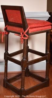 Two (2) Red Upholstered Spanish Style Bar Stools with Brass Tacks