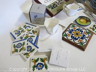 Collection including ceramic coasters, table range, cooking utensils and wine cellar system