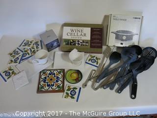 Collection including ceramic coasters, table range, cooking utensils and wine cellar system