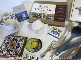 Collection including ceramic coasters, table range, cooking utensils and wine cellar system