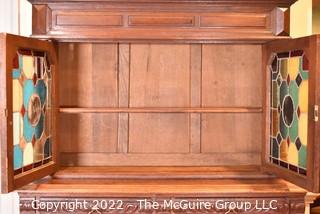 European 19th Century Renaissance Revival Style Hutch or Bar Cabinet with Stained Glass Doors One Glass Pane is Out and Bottom Door Off Hinge.  55" W 74"T 