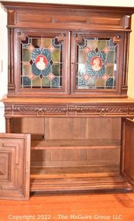 European 19th Century Renaissance Revival Style Hutch or Bar Cabinet with Stained Glass Doors One Glass Pane is Out and Bottom Door Off Hinge.  55" W 74"T 