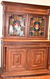 European 19th Century Renaissance Revival Style Hutch or Bar Cabinet with Stained Glass Doors One Glass Pane is Out and Bottom Door Off Hinge.  55" W 74"T 