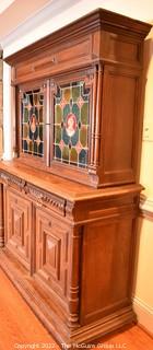 European 19th Century Renaissance Revival Style Hutch or Bar Cabinet with Stained Glass Doors One Glass Pane is Out and Bottom Door Off Hinge.  55" W 74"T 