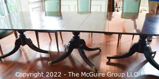 Large 19th Century Georgian Mahogany Extending Three (3) Pedestal Dining Table and Eight (8) Dining Chairs with Green Upholstery.  120" long and 51" wide..  Includes two (2) additional leaves .  Can be detached to form three separate tables