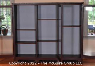 Bookcase with Three (3) Paned Glass Doors, on Castors.  15 D, 62"W, 54"T