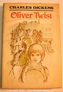 Seven (7) Books Including The Man Who Knew Kennedy, More Stories to Remember, Complete Works of Shakespeare, Dickens Oliver Twist and Kristin Labransdatter. 