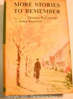 Seven (7) Books Including The Man Who Knew Kennedy, More Stories to Remember, Complete Works of Shakespeare, Dickens Oliver Twist and Kristin Labransdatter. 