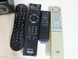 Panasonic VHS player; AIWA  MP3 player and various remotes  