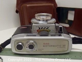 Vintage Kodak Motormatic 35mm film camera with leather case