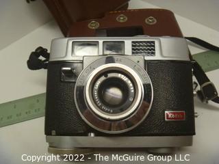 Vintage Kodak Motormatic 35mm film camera with leather case