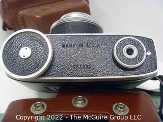 Vintage Kodak Motormatic 35mm film camera with leather case