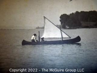 Untitled unmounted vintage photo unattributed of a canoe with sail on water (circa 1920's)