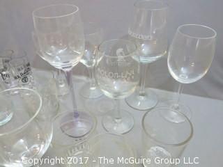 Collection of glassware including (2) Waterford crystal stems, hurricane shade and assorted stemware 