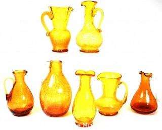 Seven (7) Pieces of Amber Pitchers and Glassware.