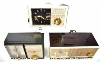 Three (3) Mid Century Arvin Electric Transistor AM/FM Clock Radios.  Some with damage.