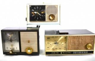 Three (3) Mid Century Arvin Electric Transistor AM/FM Clock Radios.  Some with damage.