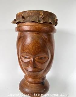 Primitive Hide and Carved Wood Figural Two Face Drum.