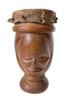 Primitive Hide and Carved Wood Figural Two Face Drum.