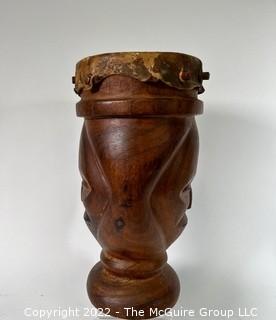 Primitive Hide and Carved Wood Figural Two Face Drum.