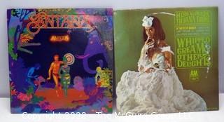 Vinyl record LP albums:   Selection of Latin titles: Santana and Herb Albert