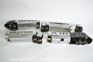 Four (4) Pieces Lionel "O" Gauge 616 Flying Yankee Passenger Train Set in Chrome and Black.616- 617- 617- 618
