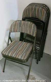 Set of (4) folding chairs with upholstered seats 