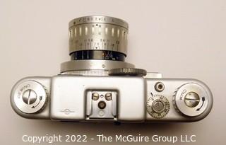 Argus C44 C Forty Four 35mm Rangefinder Camera W/ 50mm f/2.8 Lens in leather case and includes flash attachment w/bulbs