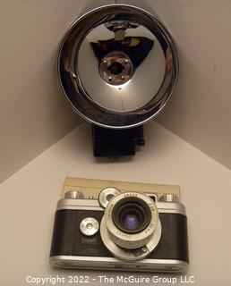 Argus C44 C Forty Four 35mm Rangefinder Camera W/ 50mm f/2.8 Lens in leather case and includes flash attachment w/bulbs