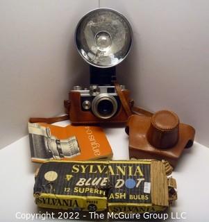 Argus C44 C Forty Four 35mm Rangefinder Camera W/ 50mm f/2.8 Lens in leather case and includes flash attachment w/bulbs