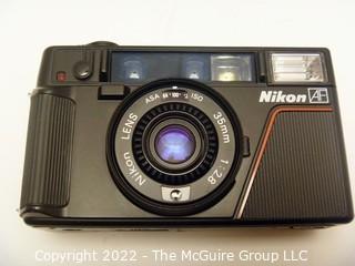 Nikon L35AF ISO 1000 35mm F2.8 Point & Shoot Film Camera w/ case and brochure/instructions  (WAS 1011RO)