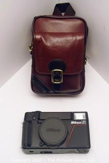 Nikon L35AF ISO 1000 35mm F2.8 Point & Shoot Film Camera w/ case and brochure/instructions  (WAS 1011RO)